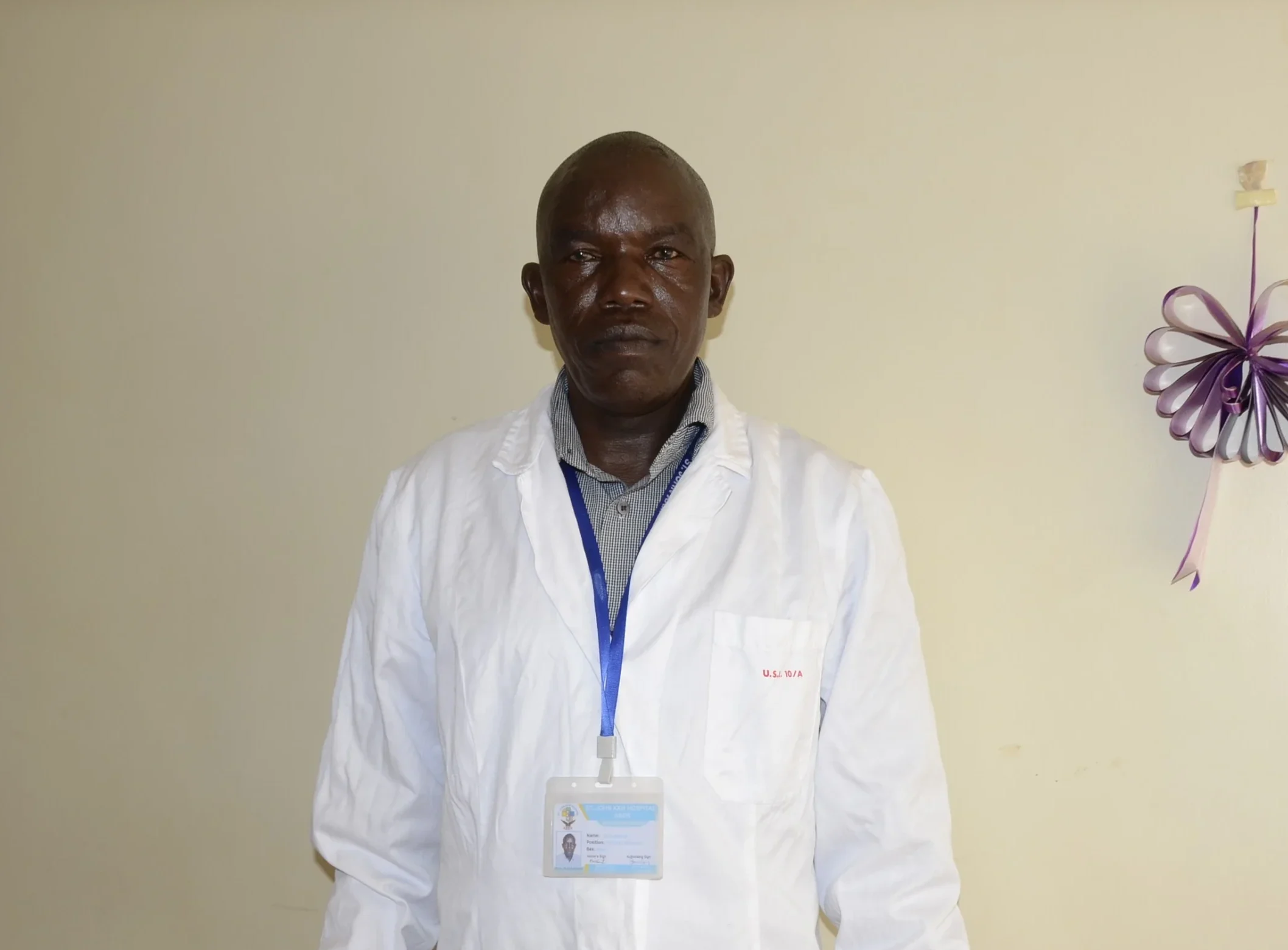 Portrait of Obot Nelson, mortuary attendant at St. John XXIII Hospital Aber assisting with safe and dignified handling of deceased patients